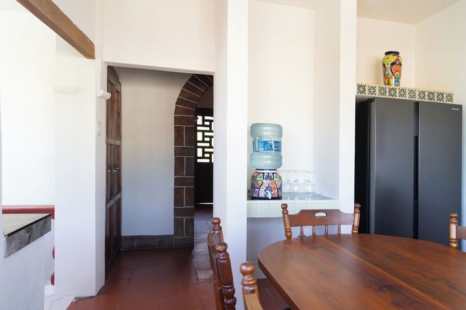 Dining room with full size refrigerator