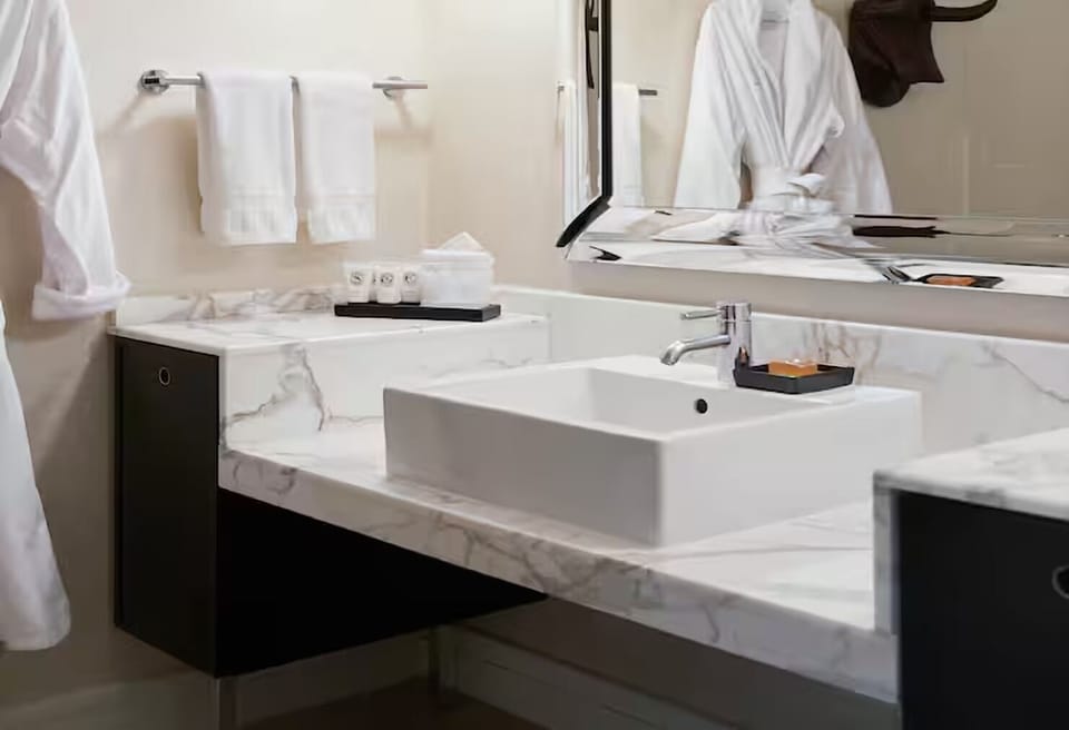 Start the day in a spotless bath with fresh towels ready.