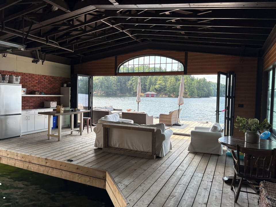 Inside new boathouse there is seating for a shade fix, fridge and prep counter.