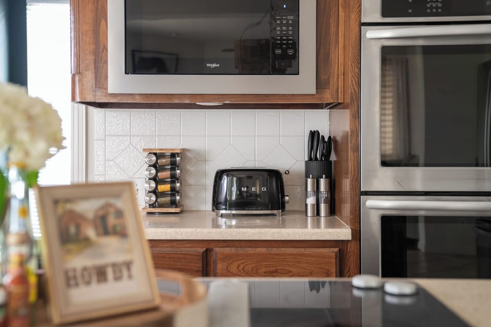 The cutest toaster you could ever want, and we keep it spicy with our full spice rack! 