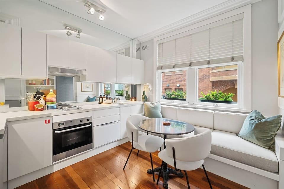 Wake up to natural light streaming into the well‑appointed kitchenette, where you can prepare meals with ease and enjoy them at the cosy dining nook.