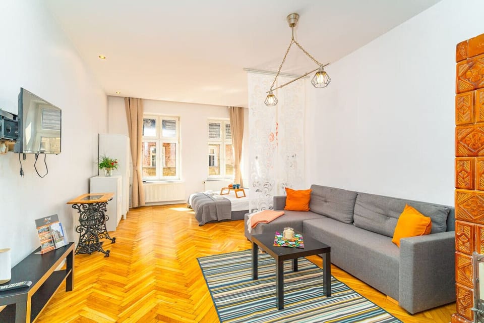 Living Area with Sofa Bed, Smart TV | Book Now with RENTUJEMY.COM