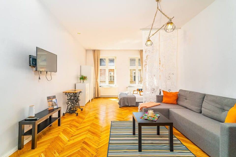 Living Area with Sofa Bed, Smart TV | Book Now with RENTUJEMY.COM