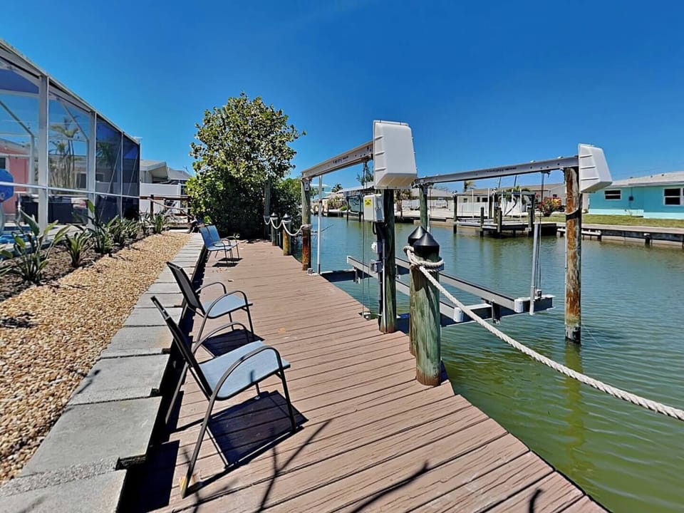 Dock on the canal. Boat lift can accommodate 10k lbs