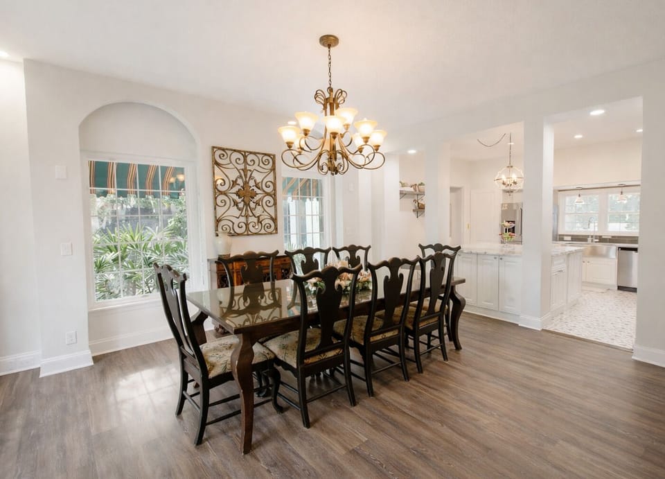 Beautiful wooden dining table seats up to 10 people.