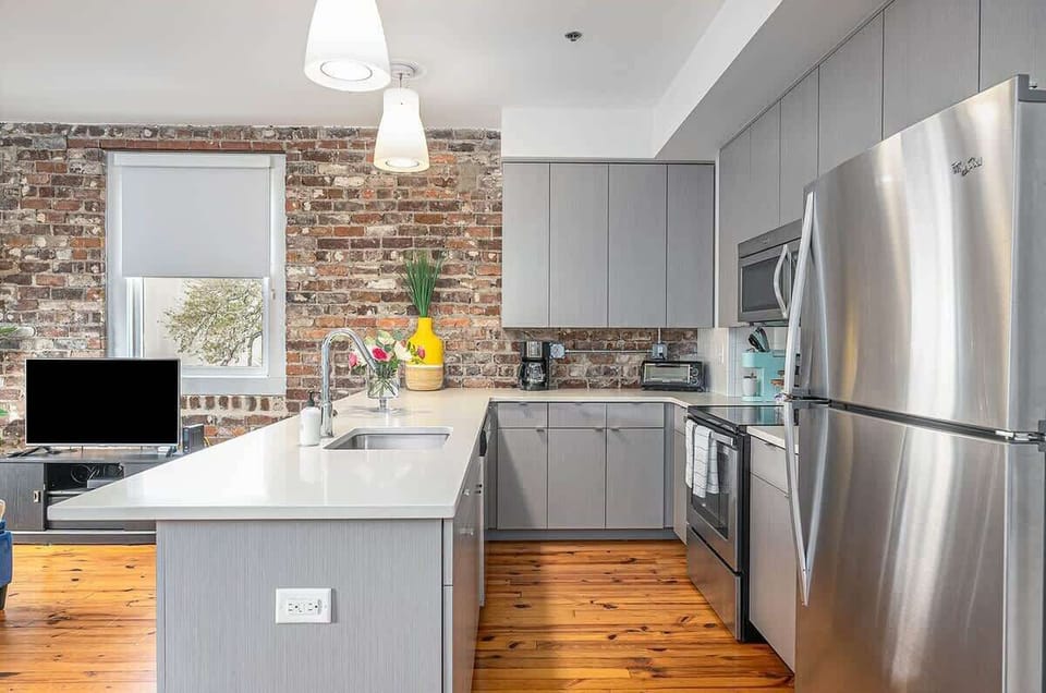 So much natural light coming through all the corner loft windows!