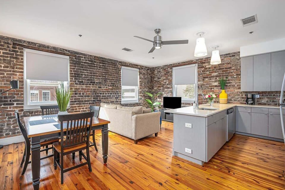 Stunning original exposed brick walls throughout! Immerse yourself into the Savannah charm!