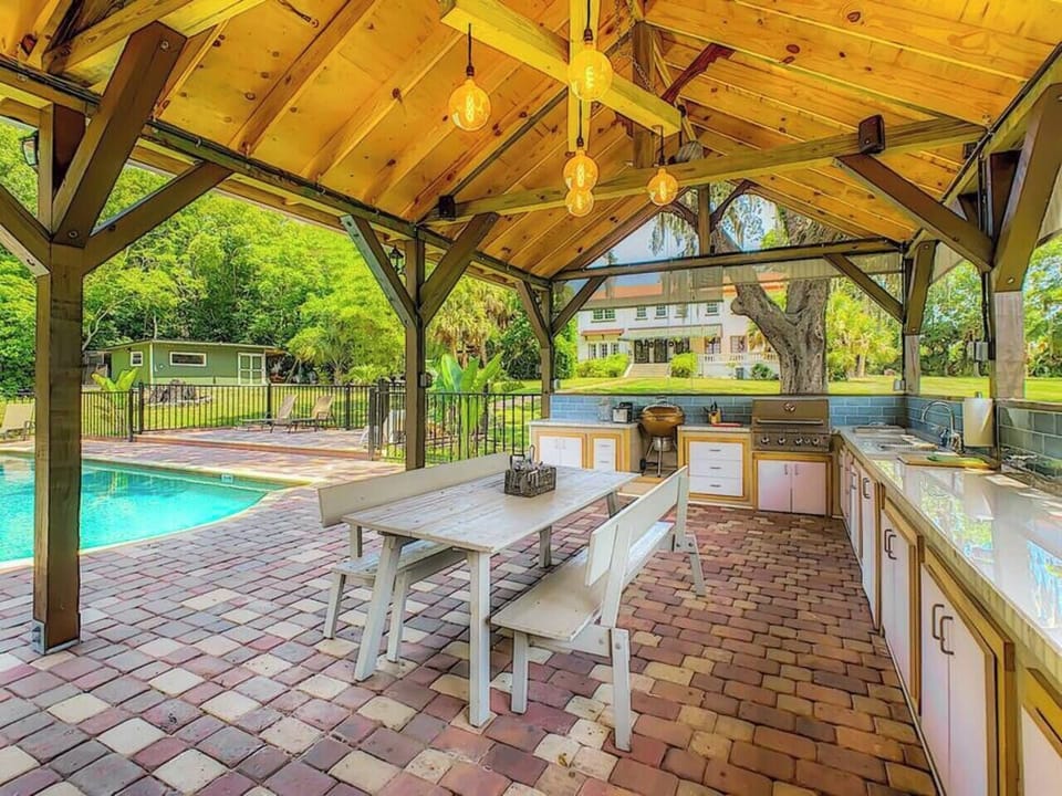 Fire up the grill and enjoy a meal by the pool.