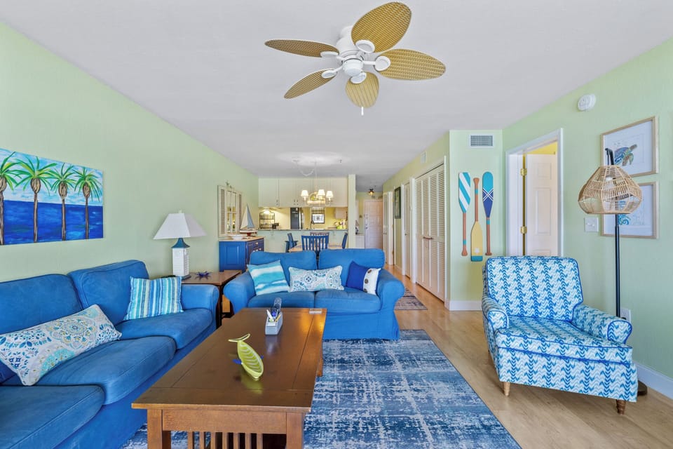 Cozy living room area, connected to the dining space.