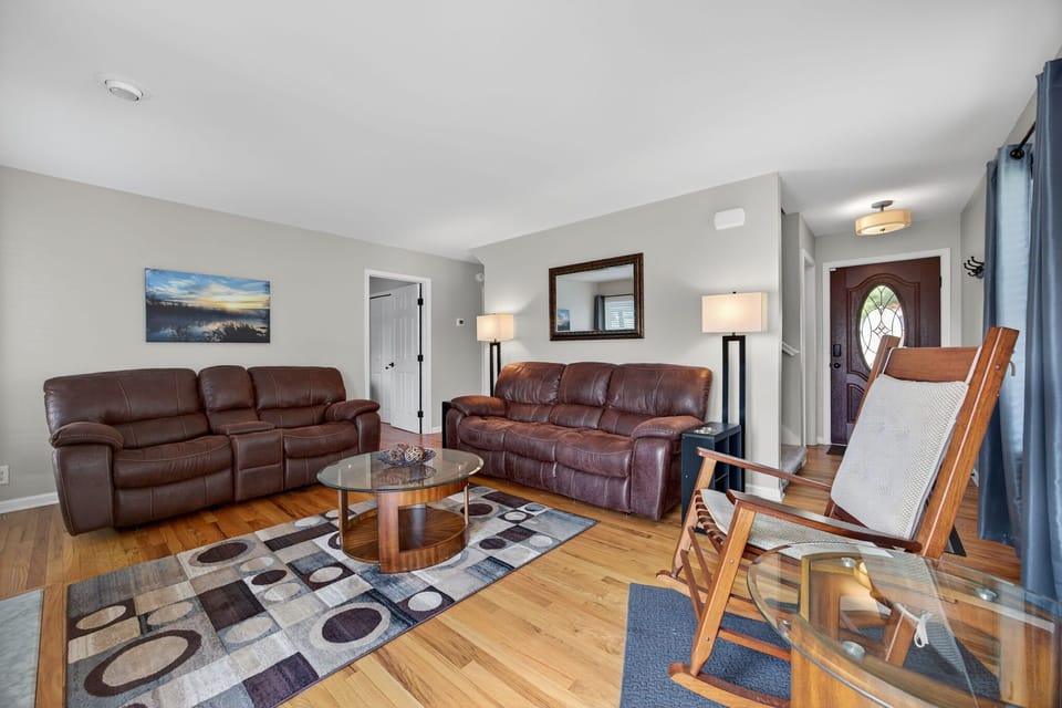 Stylish seating and natural light create an inviting space to unwind and socialize!