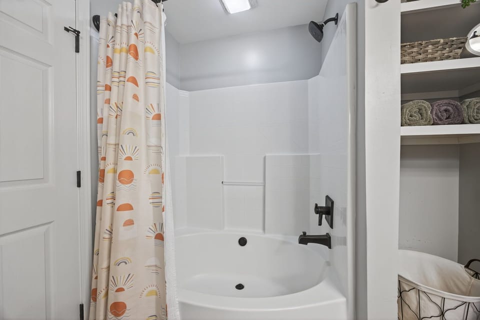 Refresh in style with modern fixtures and cheerful sun-patterned decor!