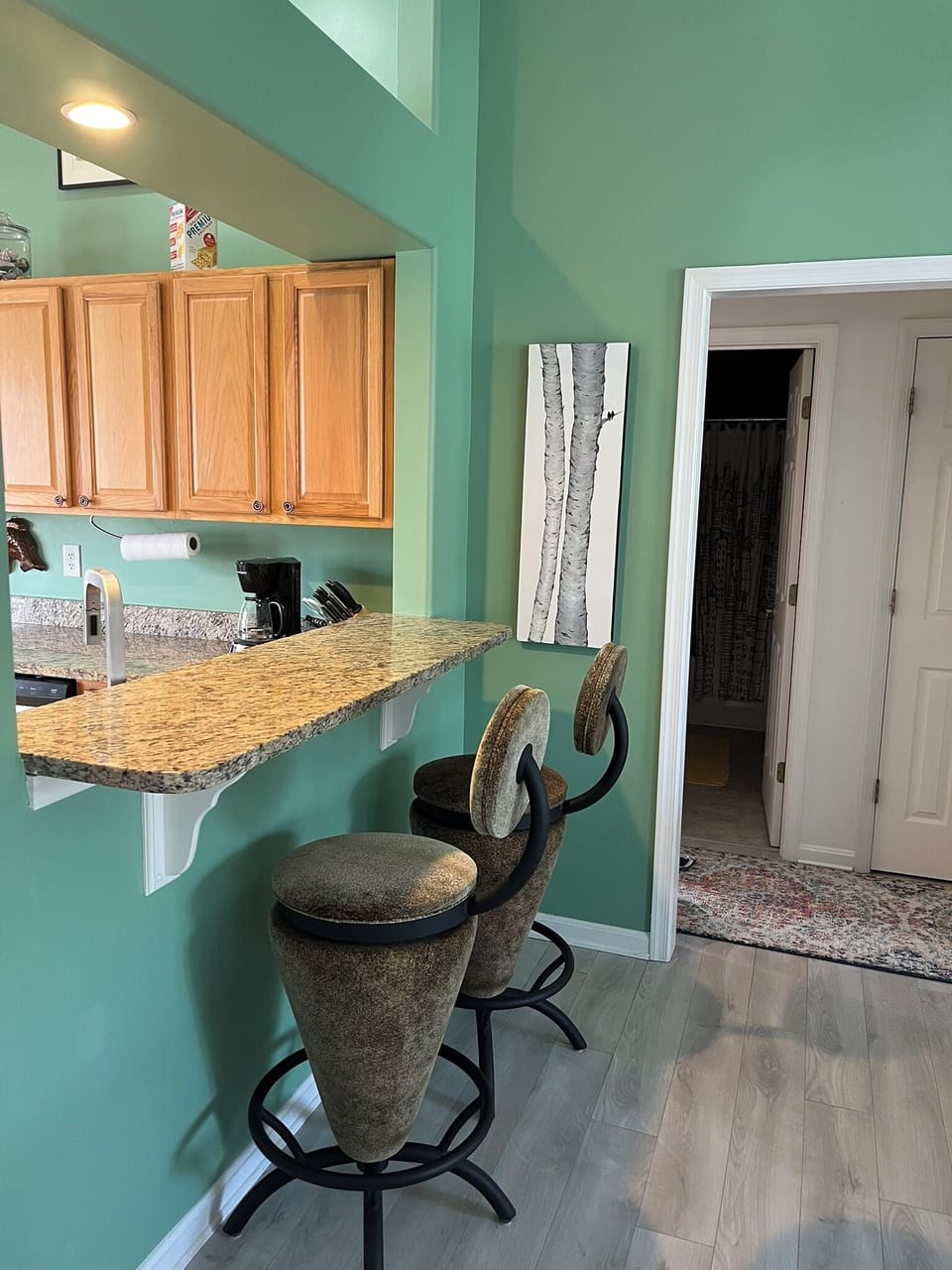 The pass-through bar is perfect for informal seating and dining.