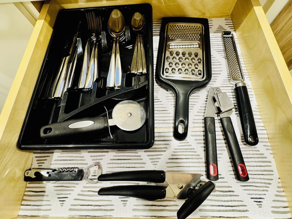 Pots, pans, plates, bowls, glasses, cups, utensils, baking dishes, French press 