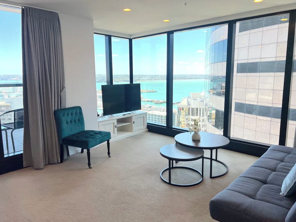 Spacious living room, Smart TV, Sofa, Coffee table. 