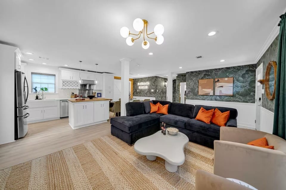 Open-concept living with cozy seating and modern kitchen design