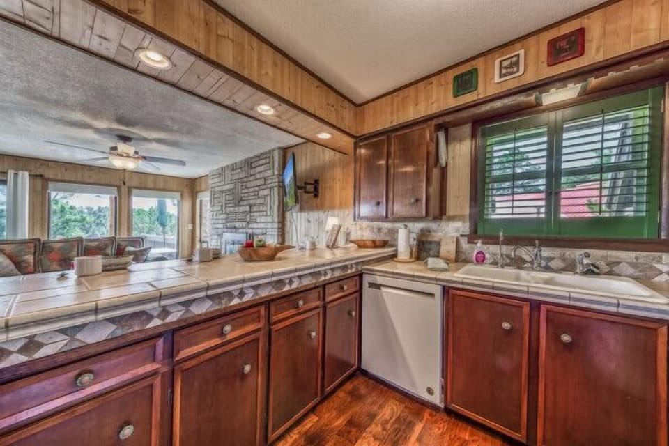 Feel at home in the fully equipped kitchen, complete with everything you need to cook and enjoy your meals just like you would at home