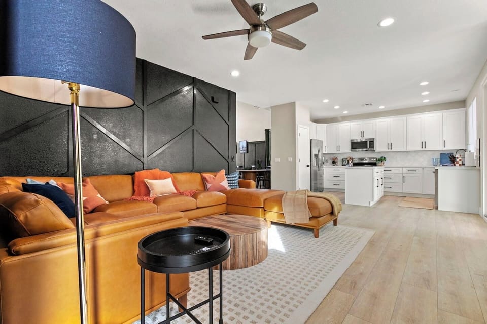 Open-concept kitchen and living area, perfect for hosting dinner parties. 