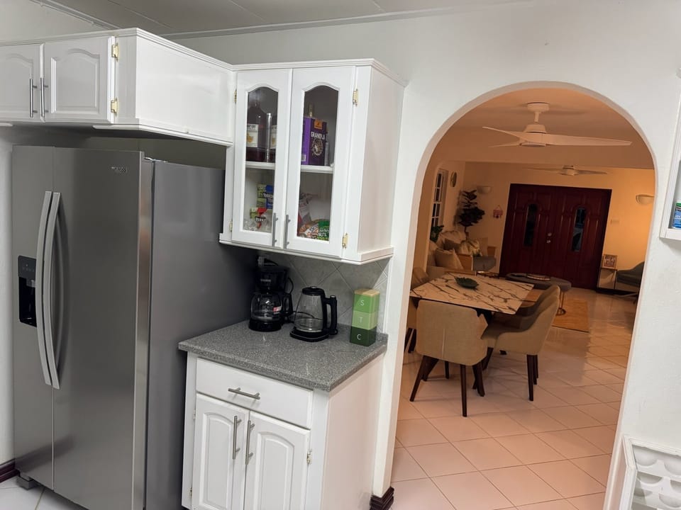 Big fridge/freezer, kettle and coffee machine.