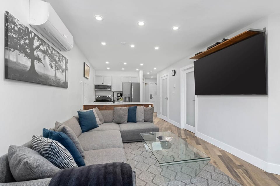 Relax and unwind in the bright, open-concept living space with smart TV and high-speed Wi-Fi.