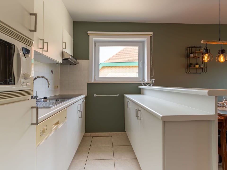 Kitchen, Countertop, Interior Design, Cabinetry, Flooring, Wood, Ceiling, Kitchen Appliance, Light Fixture, Plumbing Fixture