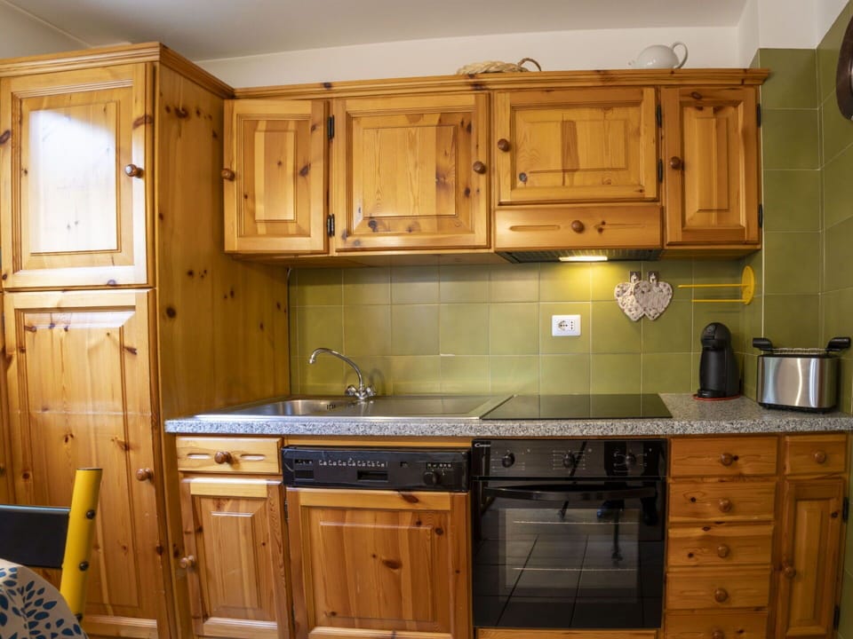 Cabinetry, Kitchen, Kitchen Appliance, Countertop, Wood, Furniture, Major Appliance, Interior Design, Cupboard, Drawer