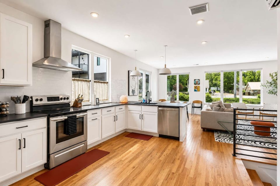 Kitchen: Spacious kitchen featuring essential cookware, appliances, and a comfortable setup for home-style meals.