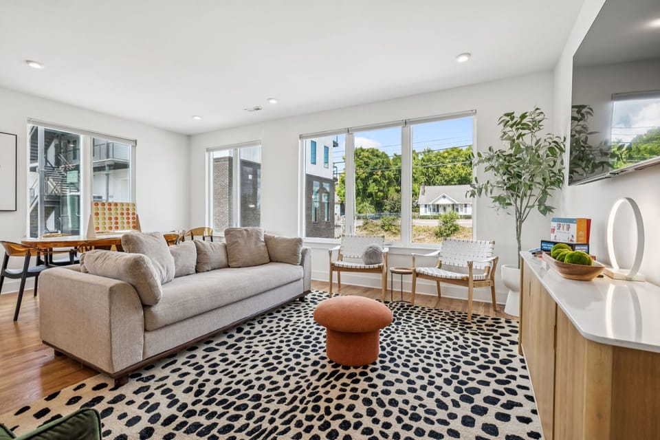 Living Room: Light, airy, and inviting. This living room is the perfect gathering spot for making memories.
