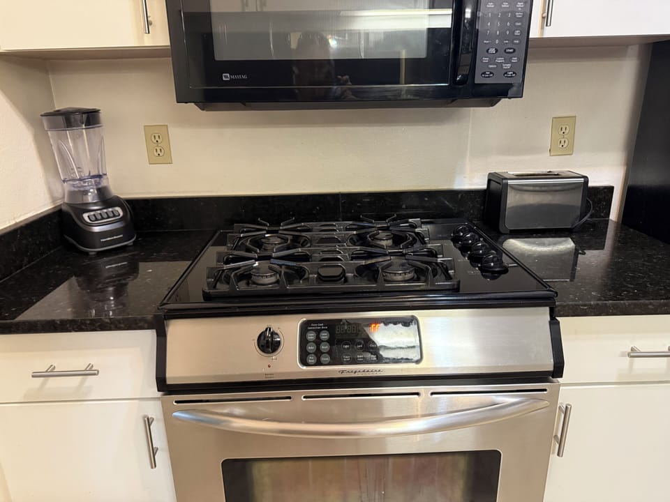 Dual fuel convection oven, over the range microwave and small appliances