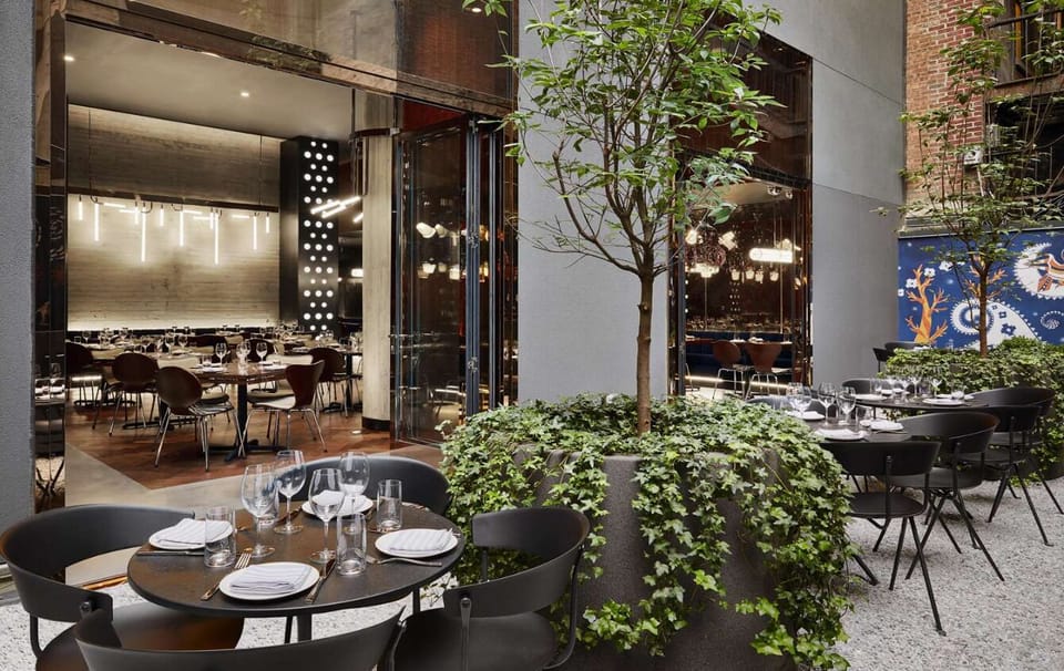 Unwind al fresco with courtyard seating and evening ambiance.