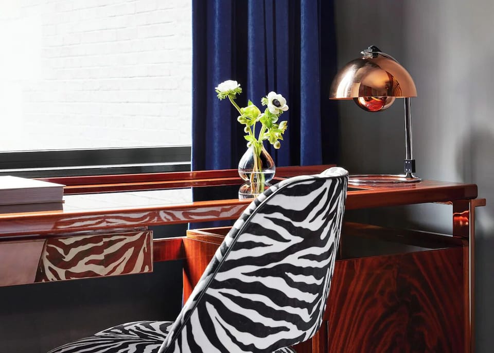 Settle in and create at the stylish in-room desk.