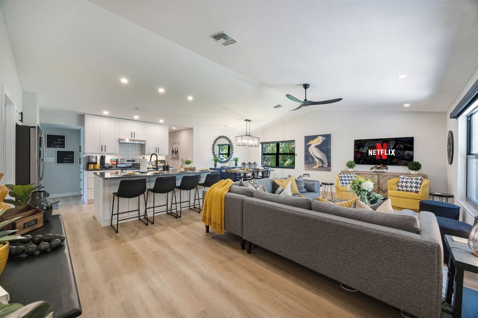 Chef’s kitchen with island opens to living and dining - great for groups!