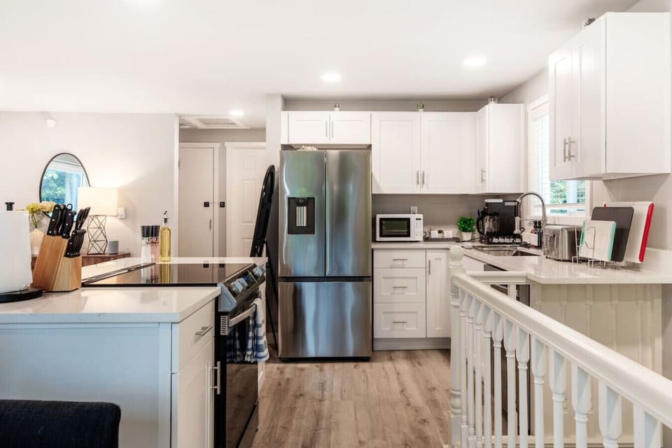 Unleash your inner chef in our well-equipped kitchen, complete with top-notch appliances and a comprehensive range of cooking essentials