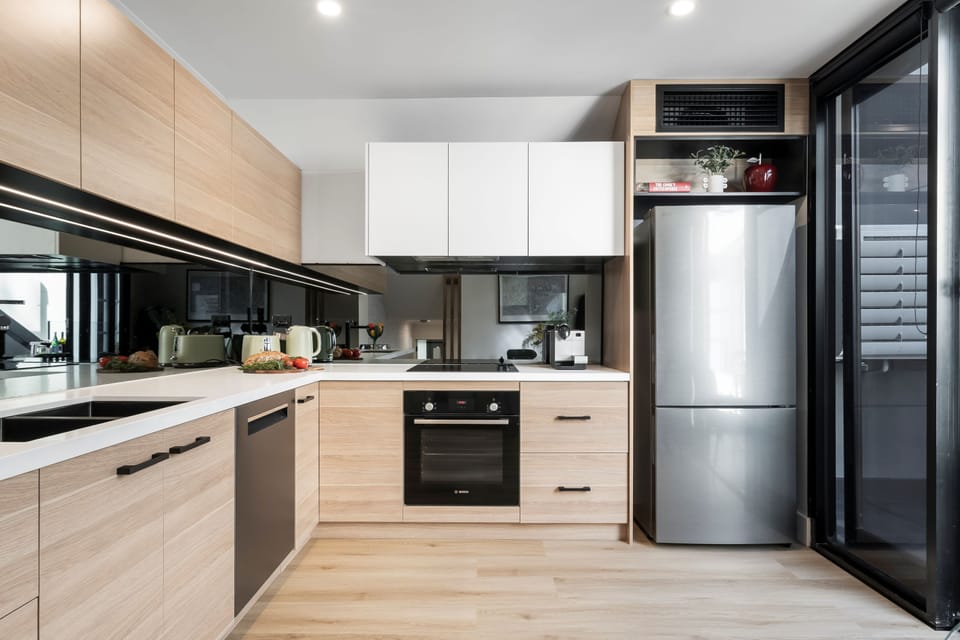 KITCHEN: The fully equipped modern kitchen has all the needed appliances and a pantry stocked with some cooking basics for the chefs convenience and pleasure.
