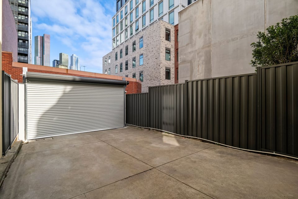 CARPORT: The secure, off street rear carport with remote control access has space for 1 to 2 cars. So close to the city the car can stay parked whilst guests use the many convenient nearby trams or the Melbourne University Parkville train station.