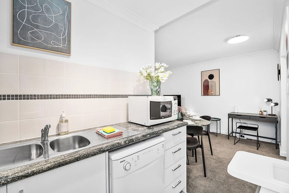 Welcome to your stylish and relaxing getaway! This inviting space seamlessly blends a cozy living area, chic dining space, and convenient kitchenette.
