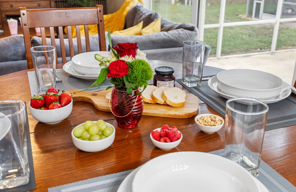 Bright and airy dining area with easy access to the kitchen and living room.