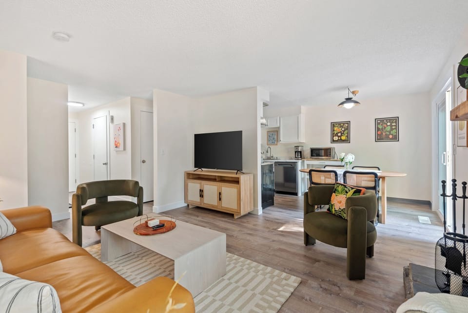 Open layout connects the fireplace, living, and dining in a way that feels just right.