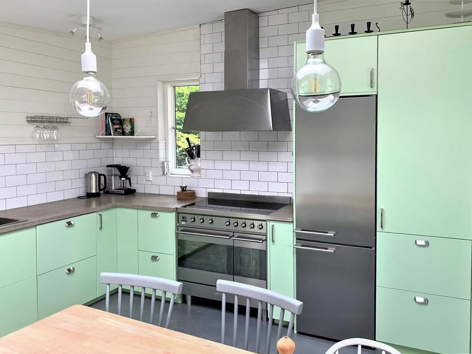 Modern kitchen appliances and counter.