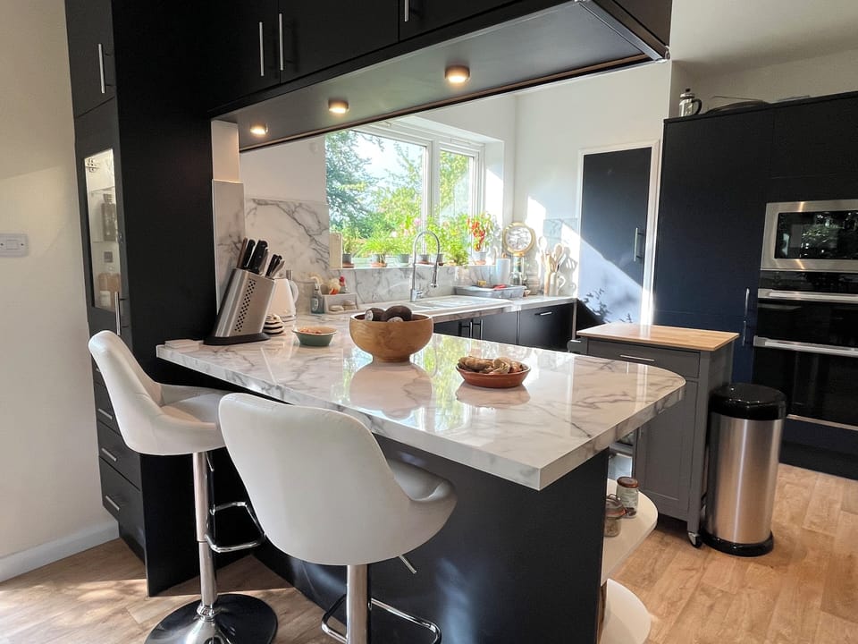 A place to help chef - if not by chopping onions, then by pouring them a drink!