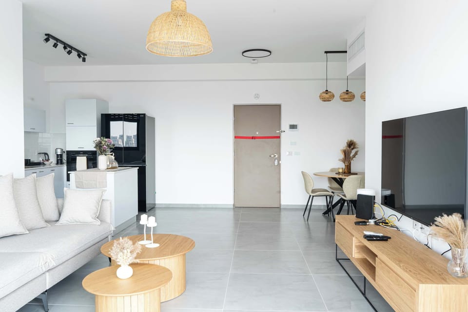 Open living and dining layout keeps relaxing, cooking, and spending time together feeling effortless.