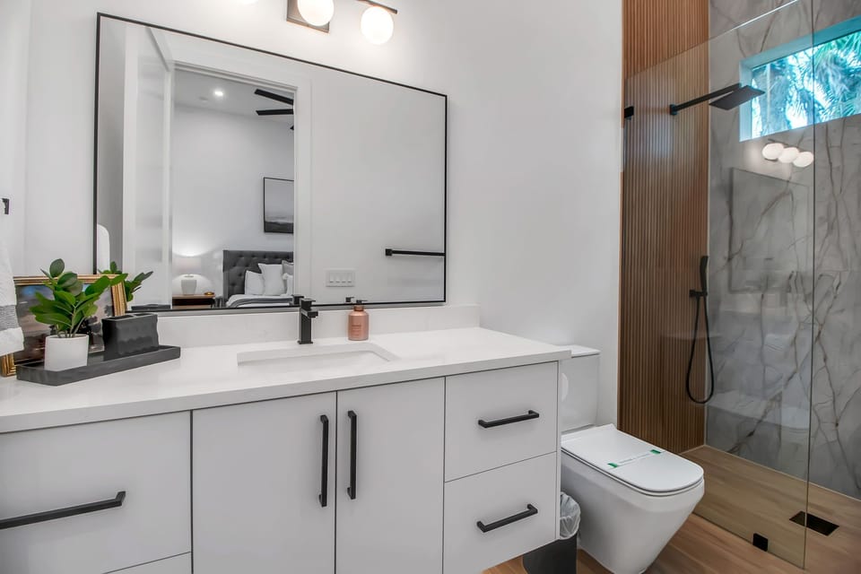 Full bathroom with glass walk-in shower
