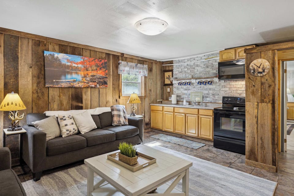 Cozy living room with smart TV and sofa bed