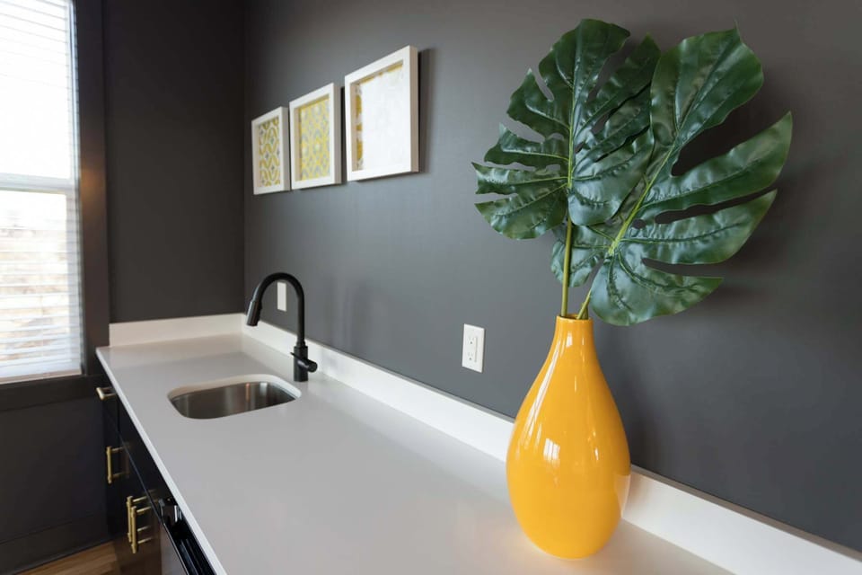 Unit #A Bonus common area with 2 queen size beds, a full size futon, and wet bar with mini fridge