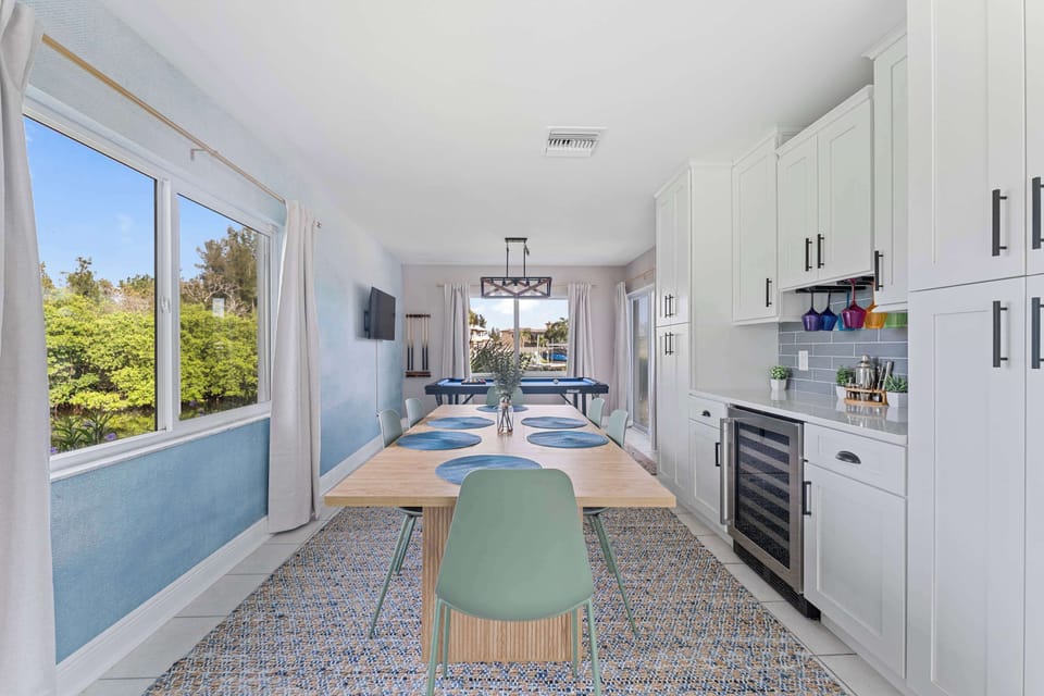 Bright, open-concept dining and kitchenette area with modern finishes—ideal for entertaining or casual meals.