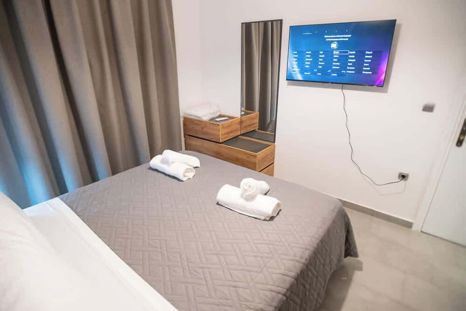 Bright and Airy Bedroom with Double Bed – Inviting retreat with crisp linens, soft ambient lighting, and tasteful decor, offering a serene atmosphere for restful nights and refreshed mornings.
