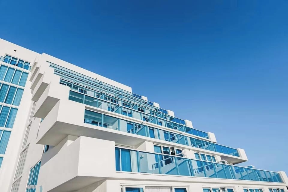 Admire crisp modern lines against endless blue sky.