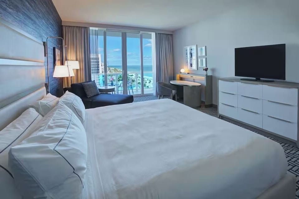 Settle in comfortably with lounge seating and an in-room workspace.