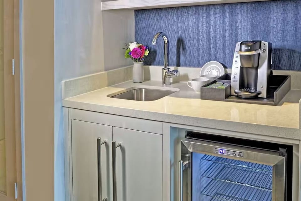 Refresh with an in-room kitchenette for snacks and morning coffee.