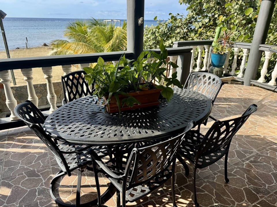 Outdoor dining on main floor balcony