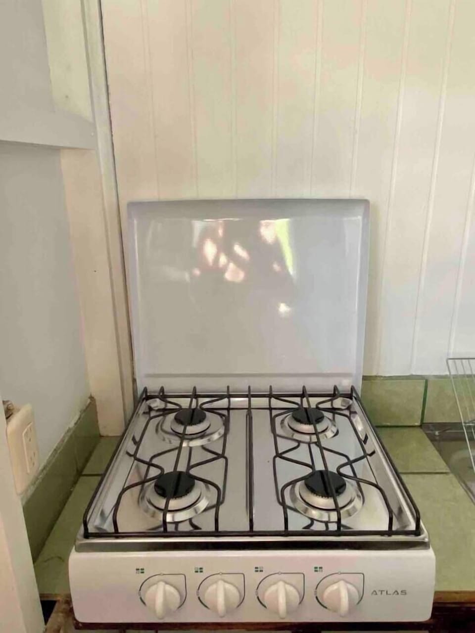 Gas stove with 4 burners.